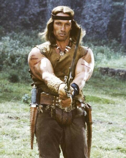 Arnold Schwarzenegger as Conan the Barbarian brandishing sword 8x10 ...