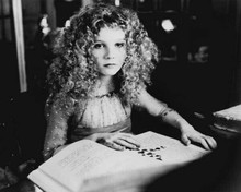 Kirsten Dunst sat at desk with book 1994 Interview With The Vampire 8x10 photo