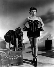 Judy Garland stuns in black basque & boots showing legs 8x10 inch photo