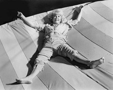 Doris Day barefoot lying on awning 8x10 inch photo