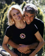 Burt Bacharach puts his arms around Angie Dickinson 1974 pose 8x10 inch photo