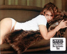 Rabid 1977 Marilyn Chambers as Rose lying on sofa 8x10 inch photo