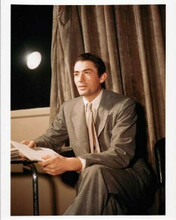 Gregory Peck young portrait in suit circa 1940's sitting on movie set 8x10 photo