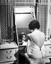 Sophia Loren with back turned sits at make-up table looks in mirror 8x10 photo