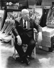 Alfred Hitchcock sits in studio chair on market set of 1972 Frenzy 8x10 photo