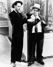 Abbott and Costello Lou helps drunken Bud look in clothes 8x10 inch photo