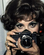 Gina Lollobrigida holds up her camera about to take picture 8x10 inch photo