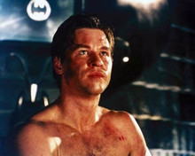 Val Kilmer barechested as Bruce Wayne with Batman insignia behind him 8x10 photo