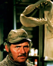 Robert Shaw as shark hunter Quint poses by shark teeth Jaws 8x10 inch photo