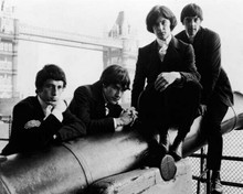 The Kinks sit on cannon by Tower Bridge London 8x10 inch photo