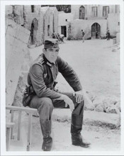 Anthony Quinn full length in Greek village in German uniform Guns of Navarone
