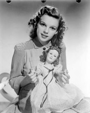 Judy Garland rare young pose holding Judy Garland doll 11x14 inch photo