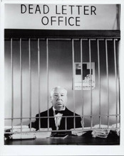 Alfred Hitchcock behind post office counter Alfred Hitchcock Presents 8x10 photo