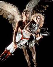 Barbarella John Phillip Law carries heroine Jane Fonda as they fly 8x10 photo