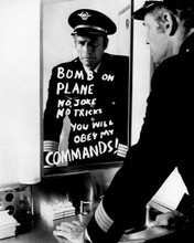 Charlton Heston as airplane Captain sees bomb message Skyjacked 8x10 photo