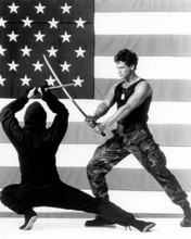 Michael Dudikoff brandishing sword 1985 movie American Ninja 8x10 inch photo