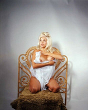 Jayne Mansfield wears open white gown kneeling on chair 4x6 inch photo