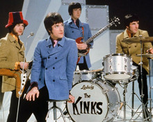 The Kinks Ray Davies sits on stool in front of band 1960's TV show 8x10 photo