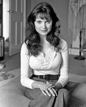 Madeline Smith looking demure in tight sweater & long skirt 1972 8x10 inch photo