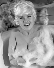 Jayne Mansfield laughs as she holds cleavage dovered in bath suds 8x10 photo