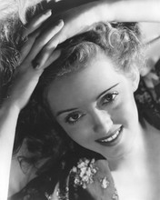 Bette Davis smiles flashing her famous eyes at camera 8x10 inch photo
