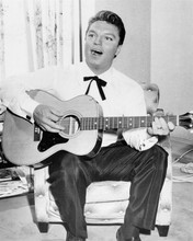 Guy Mitchell seated in western shirt playing guitar 1950's 8x10 inch photo