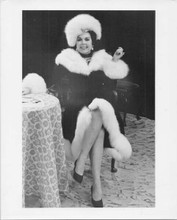 Ann Miller original 8x10 press photo showing legs seated in fur coat 1970's