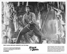 Michael Dudikoff original 8x10 photo 1988 fires machine gun River of Death