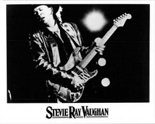 Stevie Ray Vaughan 1990's original 8x10 photo in concert playing guitar