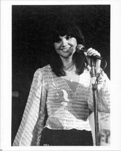 Linda Ronstadt original 8x10 photo holding microphone smiling in concert pose