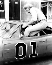 Dukes of Hazzard John Schneider jumps through window of General Lee 8x10 photo