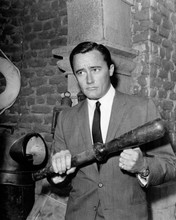 Robert Vaughn as The Man From UNCLE brandishing a bat for protection 8x10 photo
