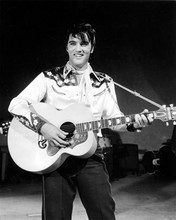 Elvis Presley in western style shirt & scarf playing guitar on stage 8x10 photo