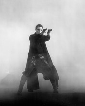 Keanue Reeves as Neo two guns blazing The Matrix 8x10 inch photo