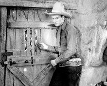 John Wayne in early 1930's western wearing tall hat & gunbelt 8x10 inch photo