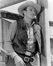 John Wayne iconic western pose in waistcoat wearing gunbelt 8x10 inch photo