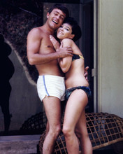 Yvonne Craig cuddles up to Bill Bixby both in swimwear 1960's 8x10 inch photo