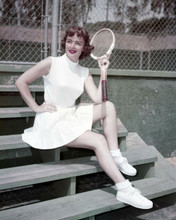 Donna Reed 1940's in white tennis dress sitting on steps with raquet 8x10 photo
