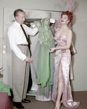 Arlene Dahl in sheer gown looks at wardrobe dresses 8x10 inch photo