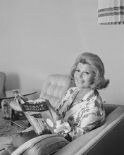 Rita Hayworth candid late 1960's pose sat on sofa at her home 8x10 inch photo