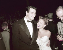 Rock Hudson in tuxedo smiling 1950's pose arm around Piper Laurie 8x10 photo