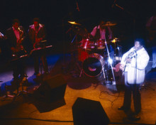 B.B. King performs on stage with his band 1990's era 8x10 inch photo