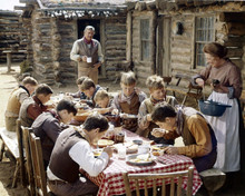 The Cowboys John Wayne looks on at young cowboys dining at table 8x10 inch photo