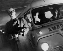 The Ipcress File Michael Caine holds machine gun by Thames Ambulance 8x10 photo