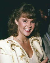 Linda Blair in white dress circa 1980's smiling for press event 8x10 inch photo