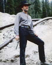 Clint Eastwood as Preacher holding gun full length pose Pale Rider 8x10 photo