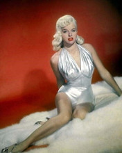 Diana Dors iconic 1950's pin-up in shimmering silver swimsuit on rug 8x10 photo