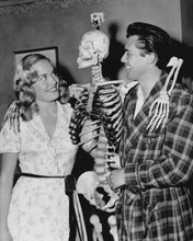 Doctor At Large 1957 Dirk Bogarde holding skeleton Shirley Eaton 8x10 photo