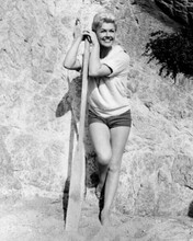 Doris Day in shorts on beach holding paddle Young at Heart 8x10 inch photo