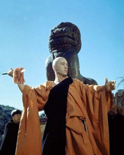Kung Fu 1972 David Carradine in Shaolin robes throwing spear 8x10 inch photo